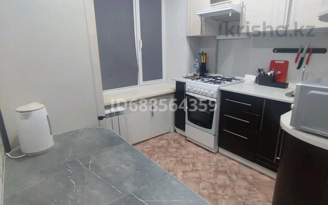 2-комнатная квартира, 48 м², 1/5 этаж помесячно, 50 лет Октября 104 Рудный - изображение 6