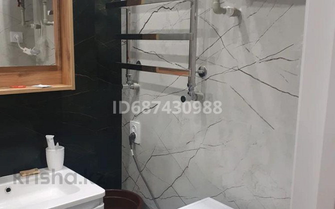3-комнатная квартира, 105 м², 14/15 этаж помесячно, 17-й мкр 46/1 - Супермаркет Нур Aqtau - photo 8