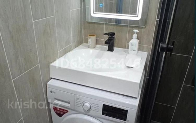 1-комнатная квартира, 31 м², 3/5 этаж посуточно, Алашахана 4 — Акимат, Самади Жезказган - изображение 5
