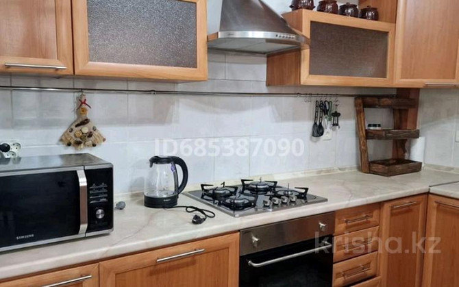 3-комнатная квартира, 85 м², 4/9 этаж посуточно, Надежда Крупская 24д Атырау - изображение 8