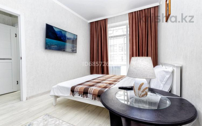1-комнатная квартира, 48 м², 9/10 этаж посуточно, Туран 40/1 — Рядом с Ботаническим садом и Кардиохи Астана - изображение 2