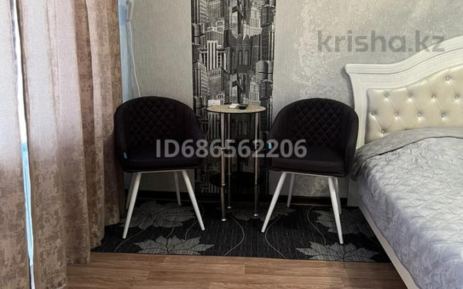 1-комнатная квартира, 30 м², 3/5 этаж посуточно, Аманжолова 2 Жезказган - изображение 4