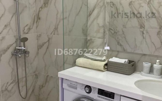 1-комнатная квартира, 60 м², 3/9 этаж посуточно, мкр Нурсая, Таумуш Жумагалиева Атырау - изображение 8