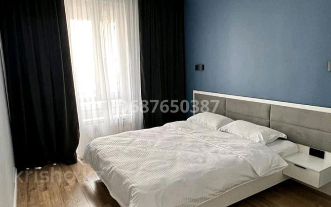 2-комнатная квартира, 58 м², 3/16 этаж посуточно, мкр Самал-1 9/2 — ТРЦ Достык Плаза Almaty - изображение 4