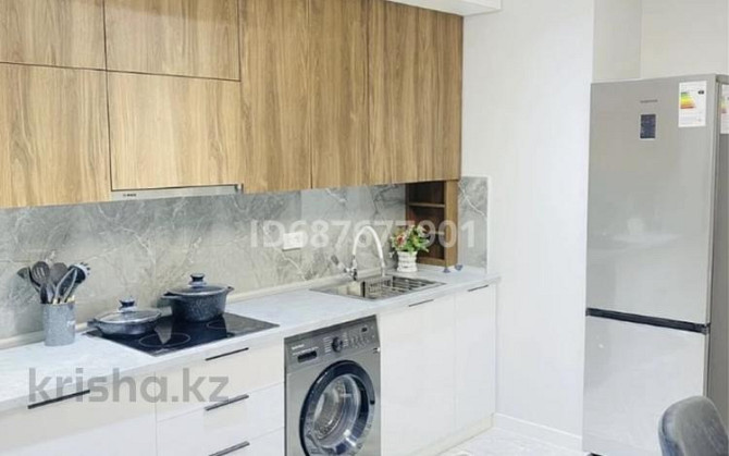 2-комнатная квартира, 56 м², 1/9 этаж посуточно, мкр Думан-2 — По Талгарскому тракту напротив Магнус Алматы - изображение 5
