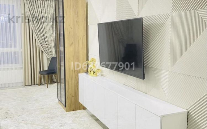 2-комнатная квартира, 56 м², 1/9 этаж посуточно, мкр Думан-2 — По Талгарскому тракту напротив Магнус Алматы - изображение 2