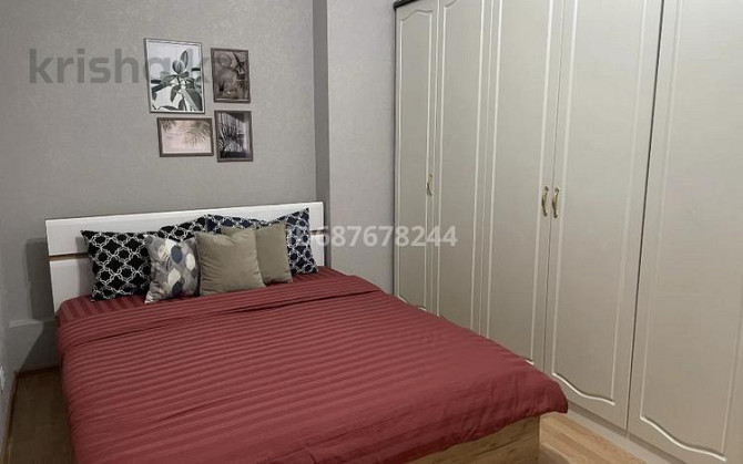 2-комнатная квартира, 60 м², 2/9 этаж посуточно, мкр Думан-2, Нурия-2 286/1 Almaty - photo 2