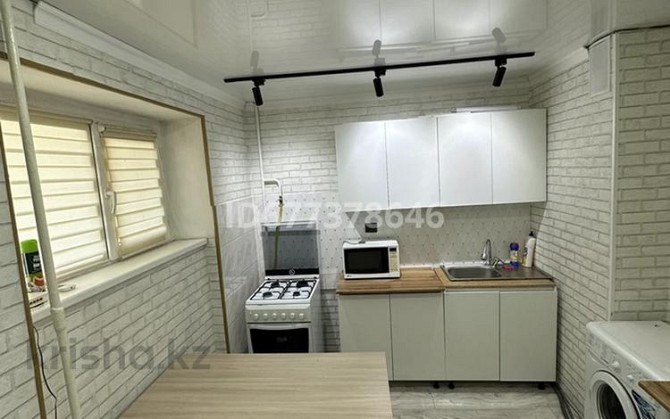 2-комнатная квартира, 63 м², 4/9 этаж посуточно, 9-й мкр 25 Aqtau - photo 1