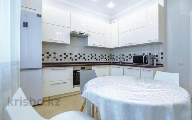 1-комнатная квартира, 46 м², 2/5 этаж посуточно, мкр. Батыс-2, проспект Алии Молдагуловой 46вк2 Aqtobe - photo 2