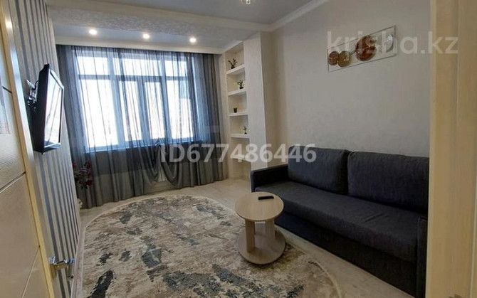 2-комнатная квартира, 65 м², 2/12 этаж посуточно, 19-й мкр 28 — Парк, Музей Aqtau - photo 2