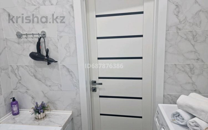 1-комнатная квартира, 38 м², 5/9 этаж посуточно, 22-4 3 — Мечети, район КАЗГЮУ Астана - изображение 5