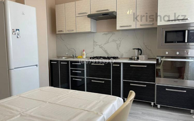 1-комнатная квартира, 50 м², 9/9 этаж посуточно, Тайманова 58 Атырау - изображение 8
