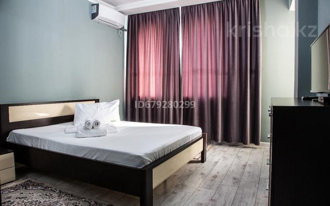 1-комнатная квартира, 50 м², 4/6 этаж посуточно, ул. Владимирская 2в Атырау - изображение 2