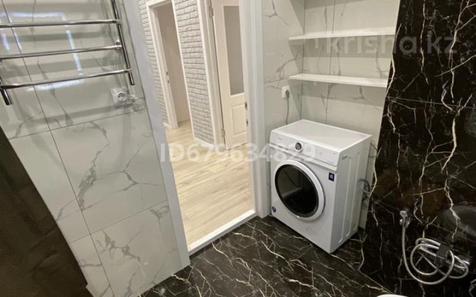 2-комнатная квартира, 50 м², 11/18 этаж посуточно, Е-753 улица 1 — ЖК Sat City, Блок А Астана - изображение 4
