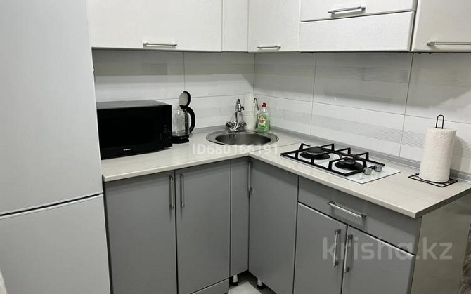 1-комнатная квартира, 50 м², 4/5 этаж посуточно, Момышулы 19/1 — Кинотеатр Комсомолец Temirtau - photo 2