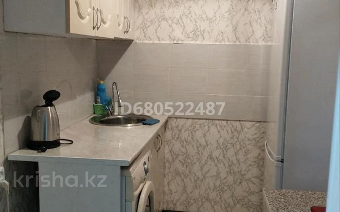 1-комнатная квартира, 32 м², 2/5 этаж посуточно, 4 микрорайон 69 Temirtau - photo 7