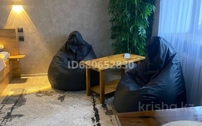 1-комнатная квартира, 32 м², 3/5 этаж посуточно, Добролюбова 34 Усть-Каменогорск - изображение 7