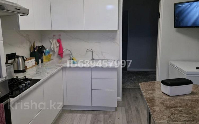 4-комнатная квартира, 91 м², 4/5 этаж, Ауезова 8 - Торгового центра Хромтау - изображение 3