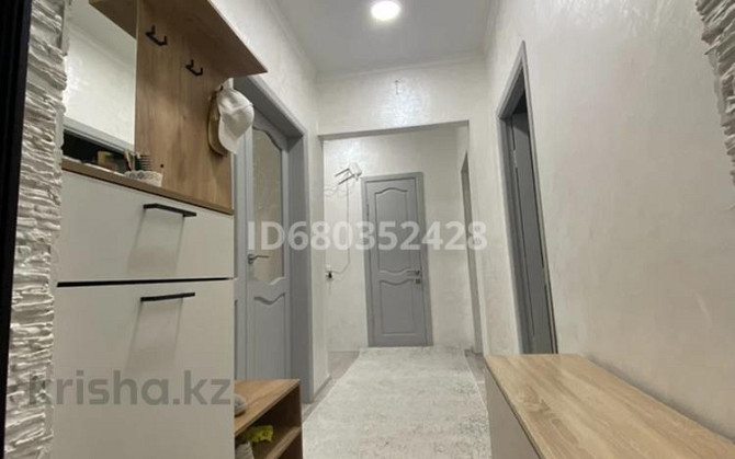 4-комнатная квартира, 90 м², 5/5 этаж, Асылбекова 93 Жезказган - изображение 1