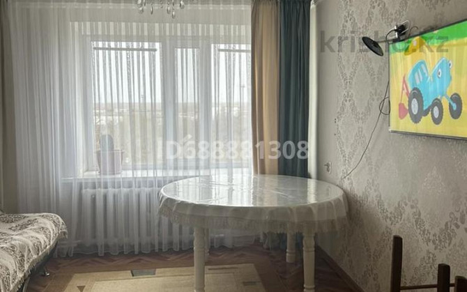 4-комнатная квартира, 77 м², 5/5 этаж, Железнодорожная 21 Жезказган - изображение 2