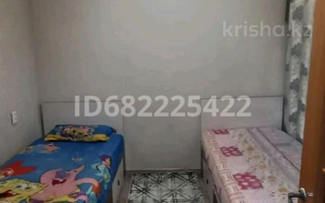 4-комнатная квартира, 61 м², 5/5 этаж, 7 мкр 30 Temirtau - photo 3