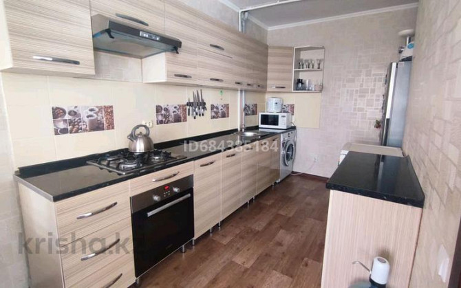 4-комнатная квартира, 80 м², 5/5 этаж, Есет-Батыра 1 - Магазин "Олимпийский" Khromtau - photo 2