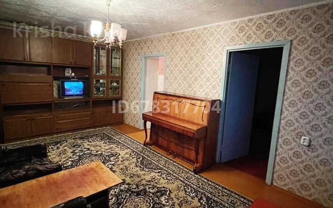 4-комнатная квартира, 63 м², 4/5 этаж, Байсеитовой 4 Temirtau - photo 1