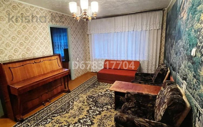 4-комнатная квартира, 63 м², 4/5 этаж, Байсеитовой 4 Temirtau - photo 2