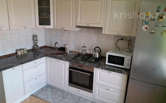 4-комнатная квартира, 87 м², 3/5 этаж, Рыскулова 189/20 - Район Спутника Талгар - изображение 7