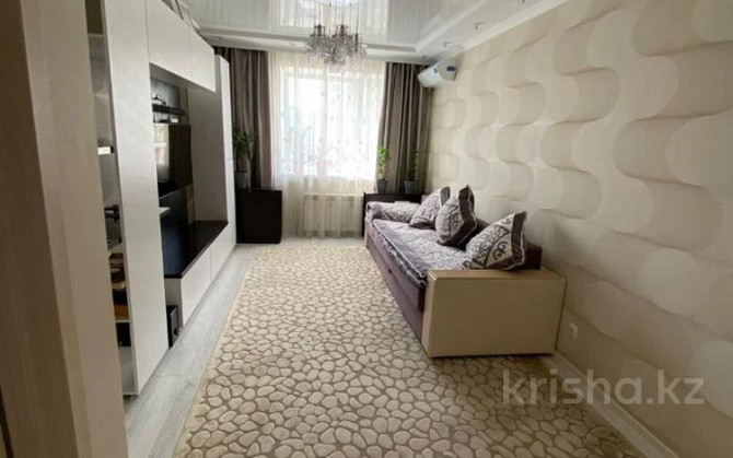 4-комнатная квартира, 87 м², 9/9 этаж, Керей и Жанибек хандар Astana - photo 2