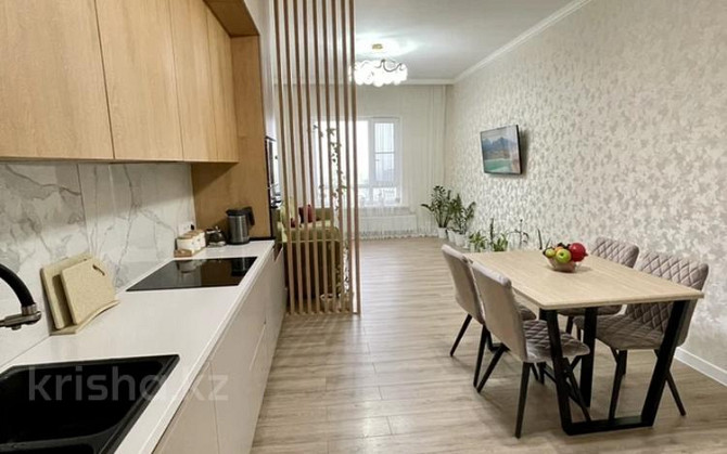 4-комнатная квартира, 105 м², 21/21 этаж, Варламова 27 А Almaty - photo 1