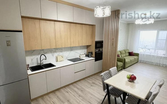 4-комнатная квартира, 105 м², 21/21 этаж, Варламова 27 А Almaty - photo 2