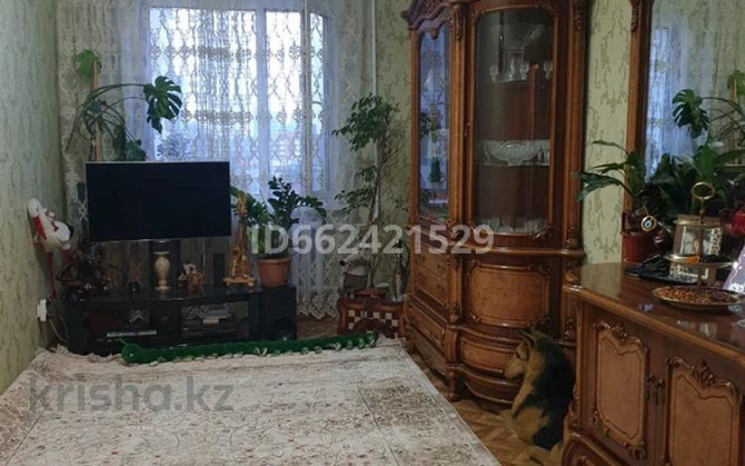 4-комнатная квартира, 80.8 м², 8/9 этаж, Сауран 12/1 - дом за зданием «Казактелеком» Астана - изображение 2