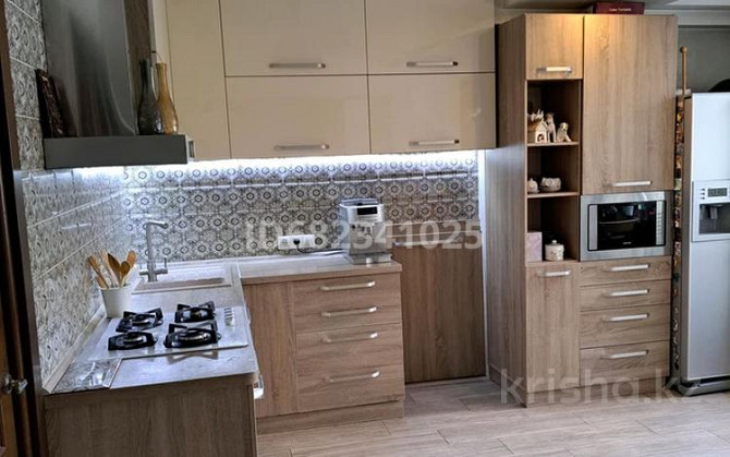 4-комнатная квартира, 100 м², 1/5 этаж, Братьев Ришата и Муслима Абдуллиных - Абдуллиных/ Жибек-Жолы Almaty - photo 7