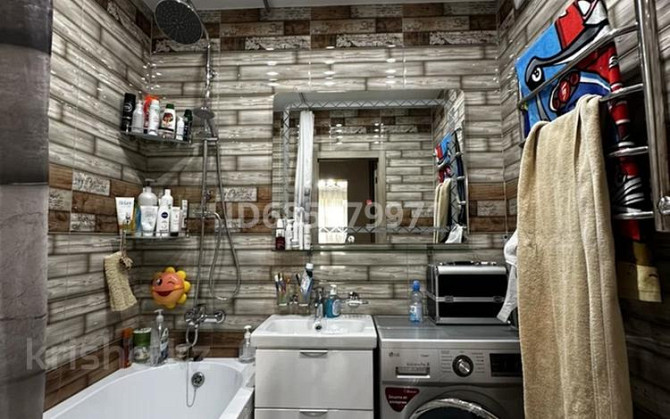 2-комнатная квартира, 42.5 м², 10/10 этаж, мкр Аксай, Б. Момышулы 25 - Базар Арыстан Алматы - изображение 3