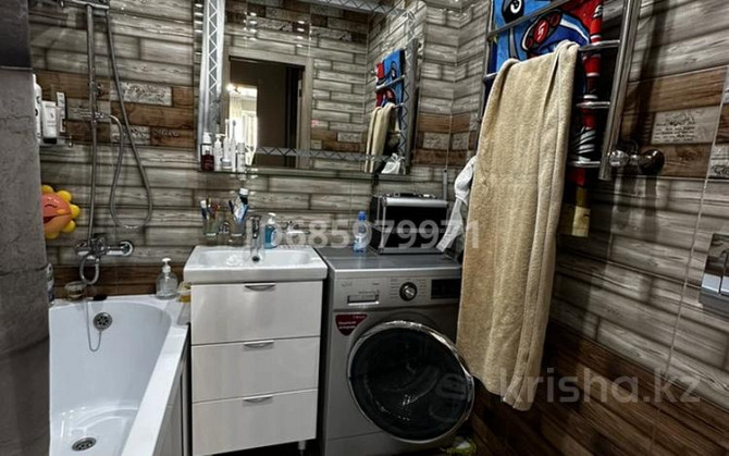 2-комнатная квартира, 42.5 м², 10/10 этаж, мкр Аксай, Б. Момышулы 25 - Базар Арыстан Алматы - изображение 2