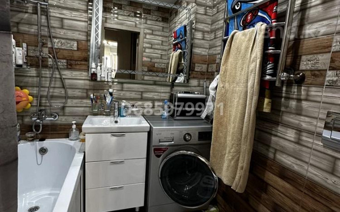 2-комнатная квартира, 42.5 м², 10/10 этаж, мкр Аксай, Б. Момышулы 25 - Базар Арыстан Алматы - изображение 1