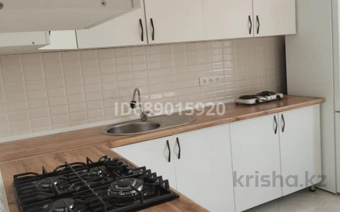 2-комнатная квартира, 71 м², 7/10 этаж, мкр Шугыла, Жунисова 14/14 Almaty - photo 2