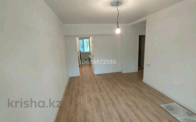 2-комнатная квартира, 50 м², 2/5 этаж, Жандосова 162а - уг. ул. Берегового Almaty - photo 6