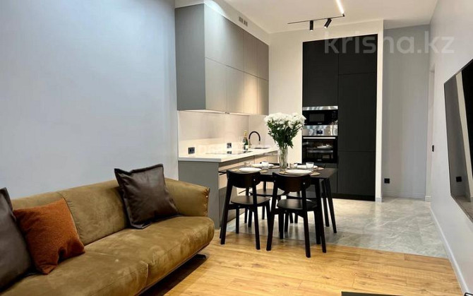 2-комнатная квартира, 50 м², 8/13 этаж, Досмухамедова 83 - А 98 Алматы - изображение 5