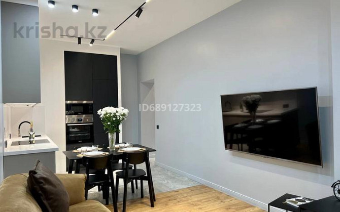 2-комнатная квартира, 50 м², 8/13 этаж, Досмухамедова 83 - А 98 Алматы - изображение 8