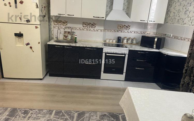 2-комнатная квартира, 70 м², 2/13 этаж, мкр Аксай-5 3б - ул Момыш-улы уг ул Жубанова Almaty - photo 2