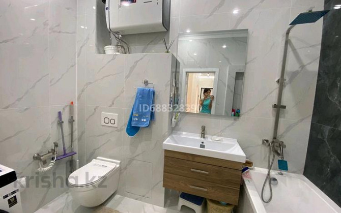 4-комнатная квартира, 120 м², 9/10 этаж, мкр Юго-Восток, Дюсембекова 17 Караганда - изображение 5