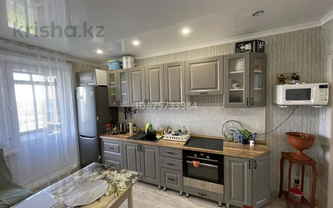 4-комнатная квартира, 81 м², 7/9 этаж, Ауэзова 21/2 Ekibastuz - photo 1