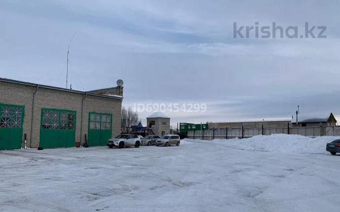 Промбаза 650 соток, 5-й микрорайон, Карбышева 38/2 — На против автовокзала Костанай - изображение 2