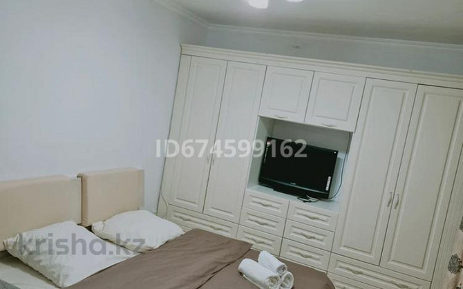 1-комнатная квартира, 42 м², 17/22 этаж посуточно, Сыганак Astana - photo 1