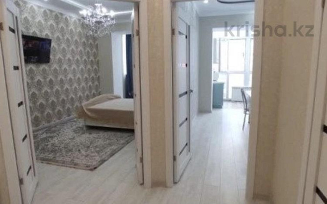 1-комнатная квартира, 48 м², 9/12 этаж посуточно, Толе би 11а Almaty - photo 1