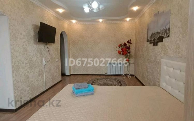 1-комнатная квартира, 60 м², 2/4 этаж посуточно, Генерала Рахимова 1 — Проспект Жамбыла Taraz - photo 2