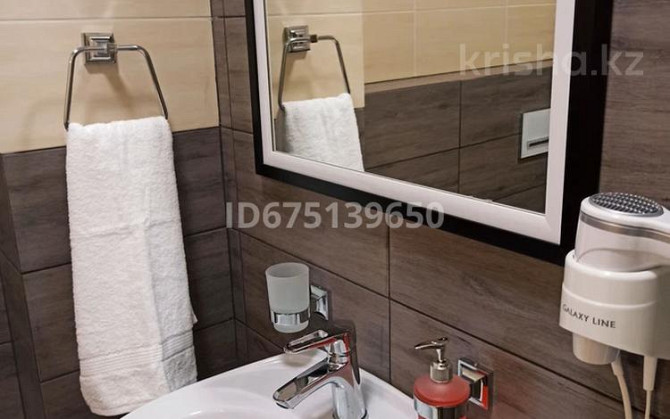 2-комнатная квартира, 44 м², 2/12 этаж посуточно, Калдаякова 17 — Нажимеденова Astana - photo 5
