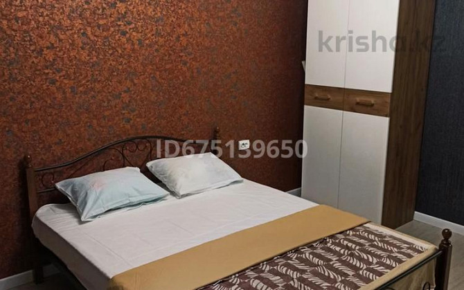 2-комнатная квартира, 44 м², 2/12 этаж посуточно, Калдаякова 17 — Нажимеденова Astana - photo 6